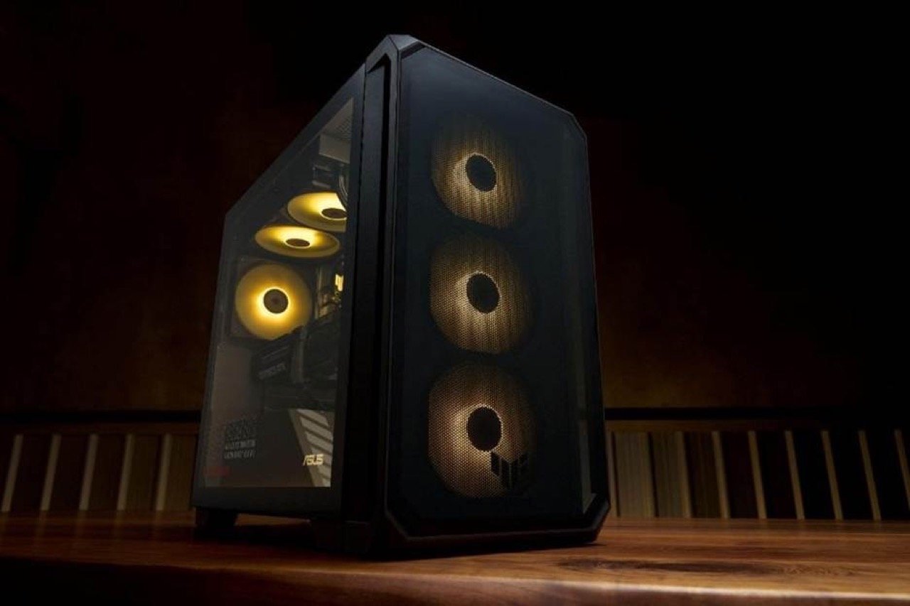 ASUS TUF Gaming T700 TM700TZ full tower gaming desktop with quad 65 CFM cooling fans and signature orange ambient lighting