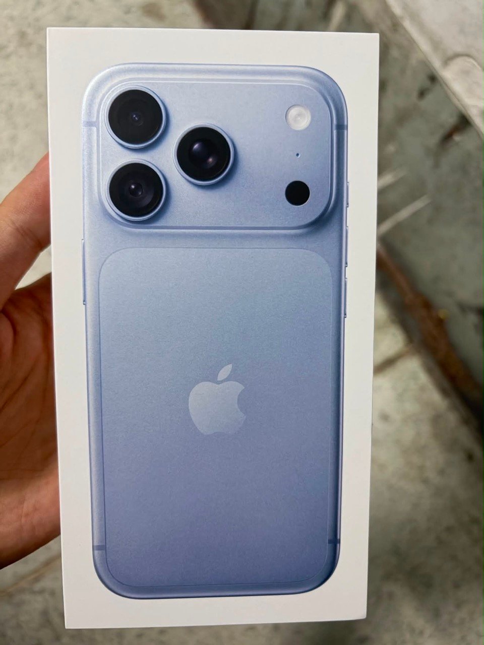 Leaked iPhone 18 Pro retail packaging box showing Sky Blue colorway and variable aperture camera module