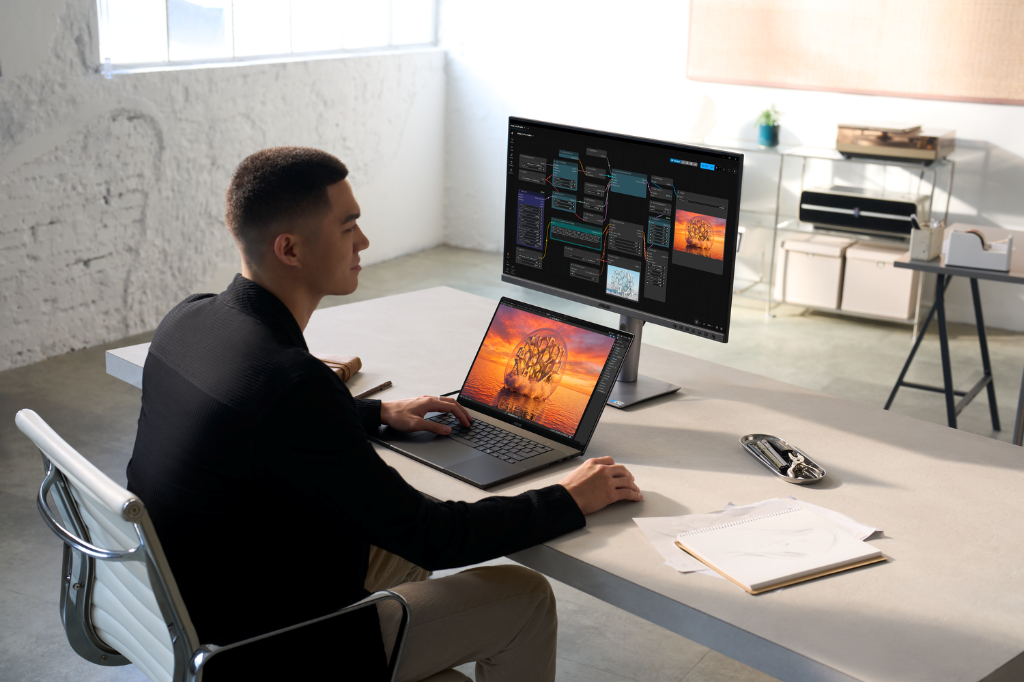Creator utilizing ASUS ProArt P16 connected to ComfyUI node-based local AI workflow