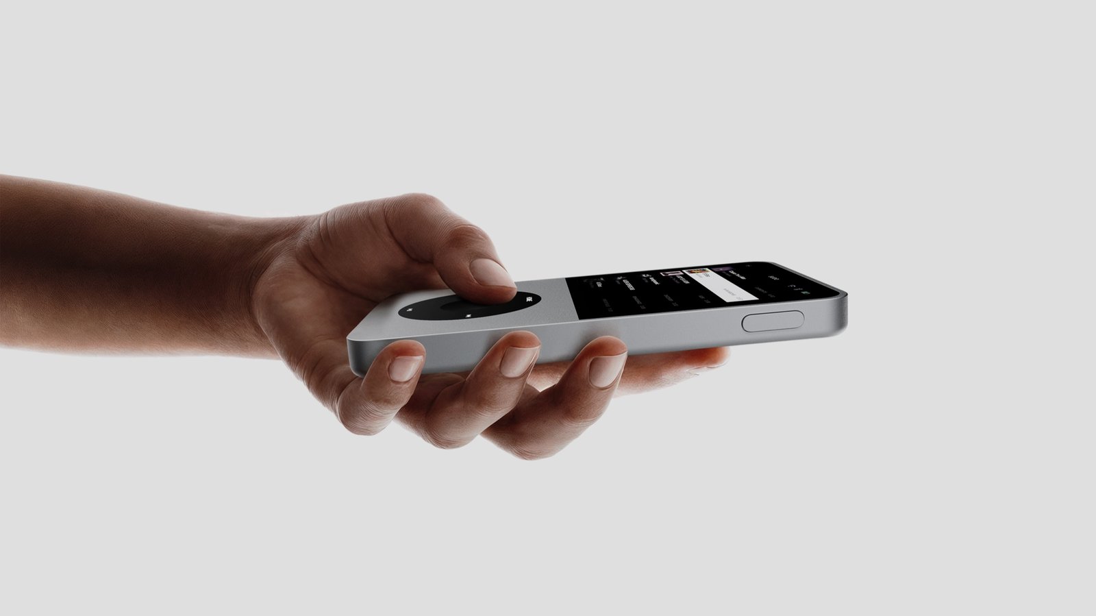 Sudo music player held in hand featuring tactile control wheel and square touchscreen