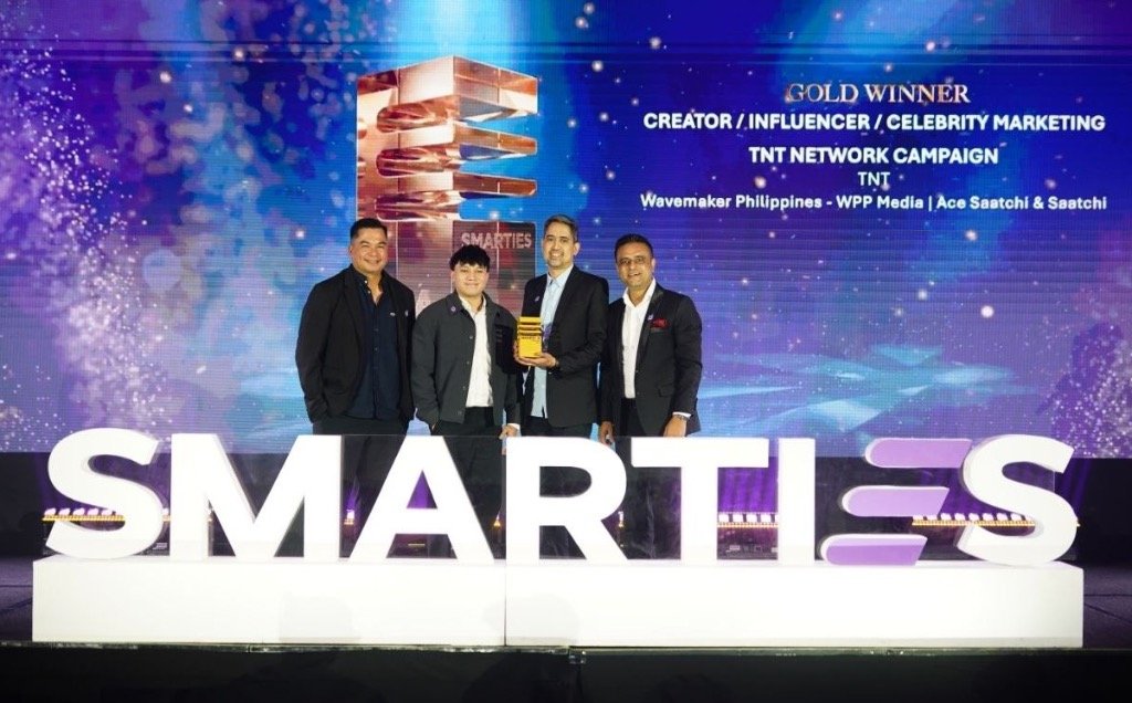TNT and Smart Communications executives receiving the Gold Award at SMARTIES Philippines